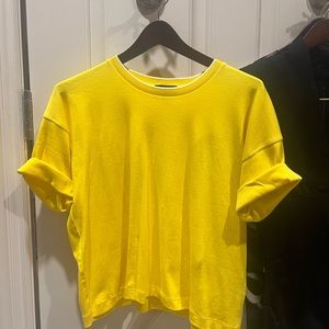 Rag n bone small bright yellow t shirt with a pocket and rolled sleeves.